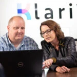 KlariVis team members consulting with a bank.